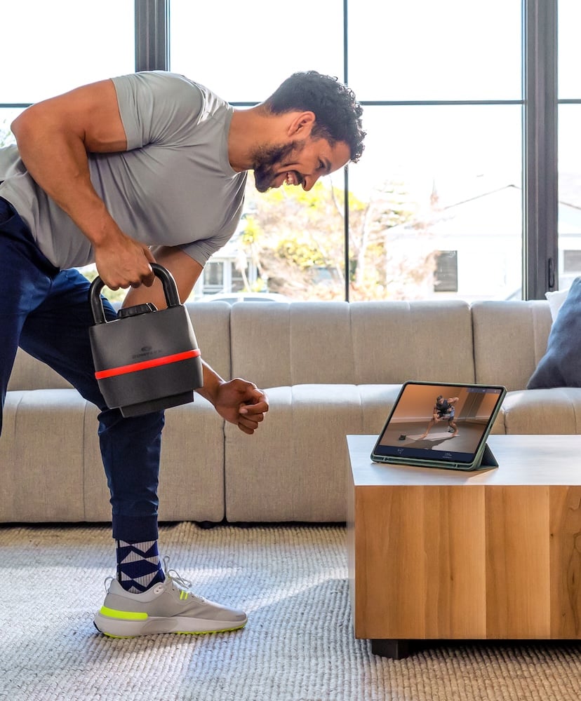 Man using a kettlebell